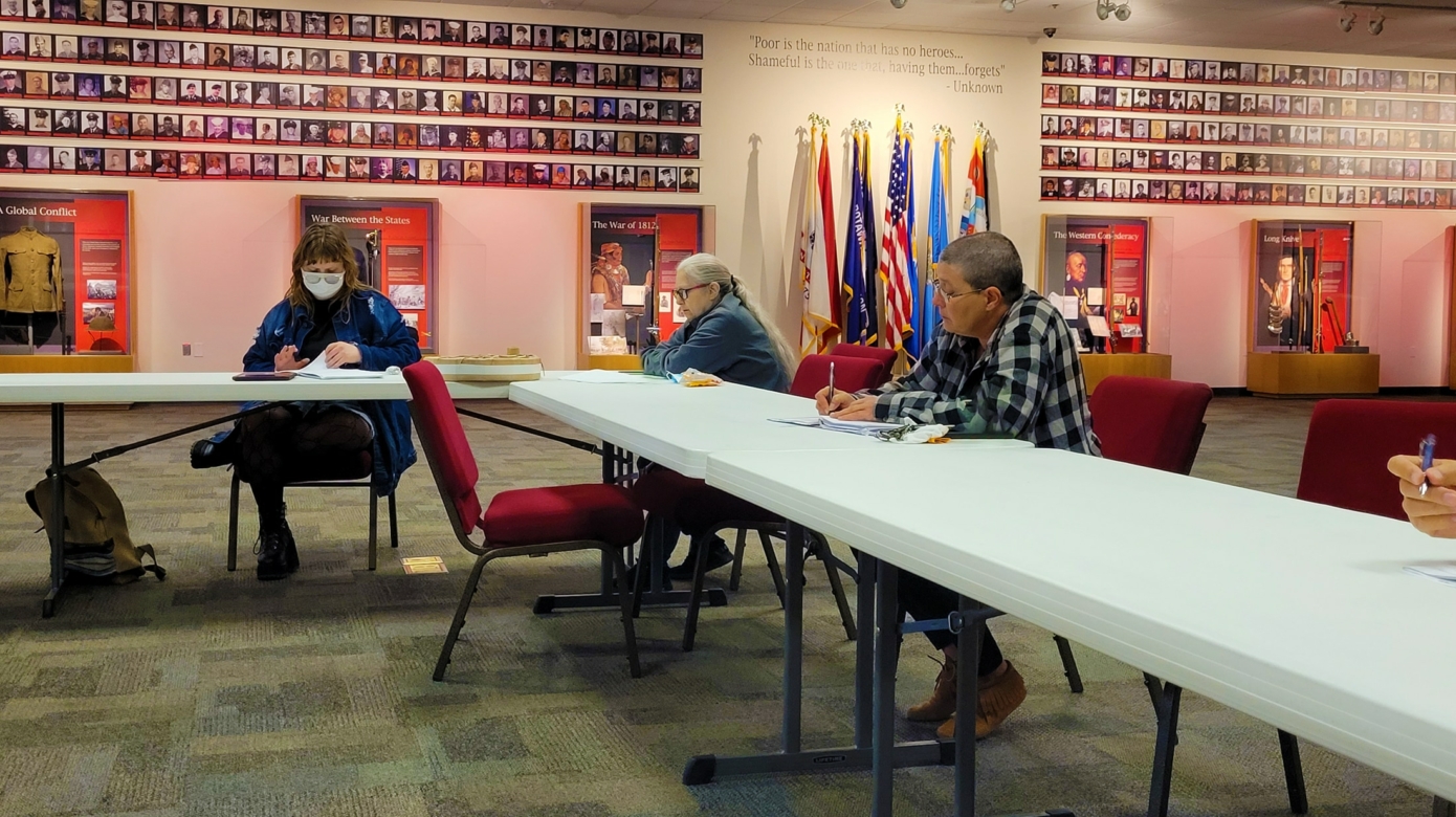 Tribal members sit around tables in the CPN Cultural Heritage Center Long Room studying the Potawatomi language at one of Language Department Director Justin Neely's classes.
