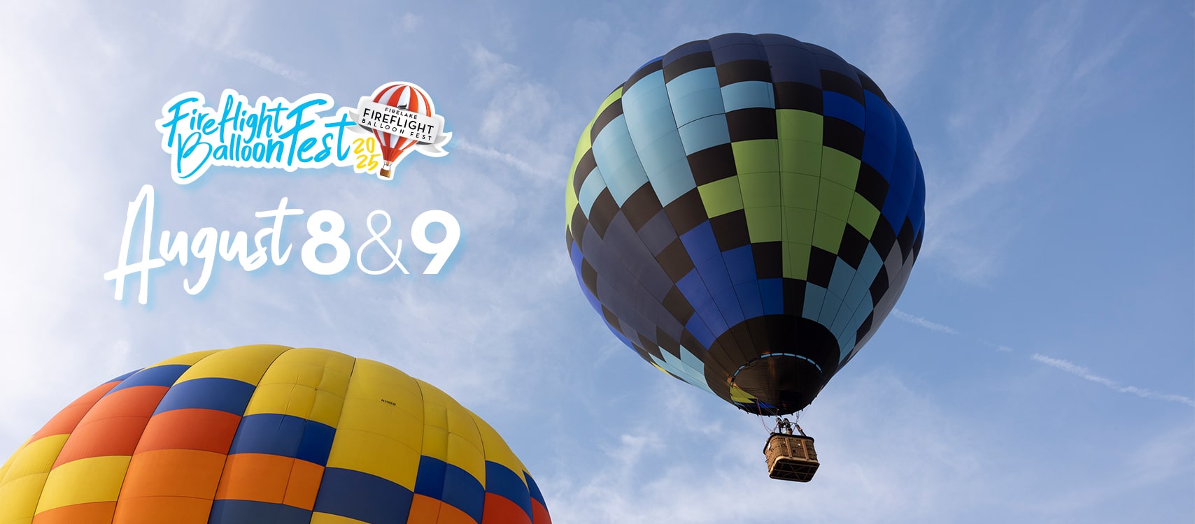Two hot air balloons in flight, viewed from below. White text over the image announces the 2025 Fireflight Balloon Festival on August 8 and 9.