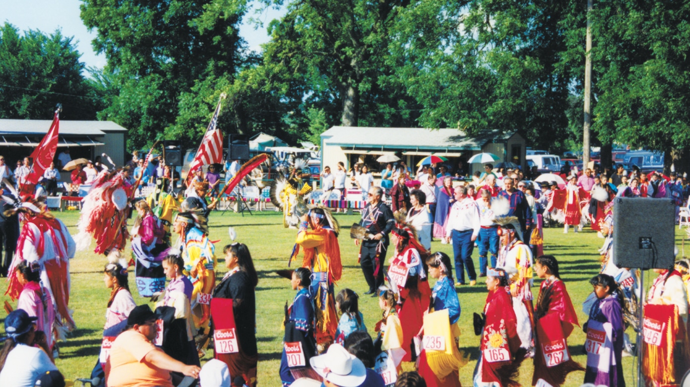 Chairman Barrett and Vice-Chairman Capps lead Grand Entry during the 1980s Intertribal Powwow.