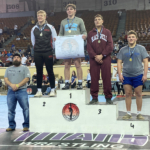 CPN tribal member and high school wrestler Lane Gourley stands at fourth place on the podium at the 2022 Oklahoma state wrestling tournament.