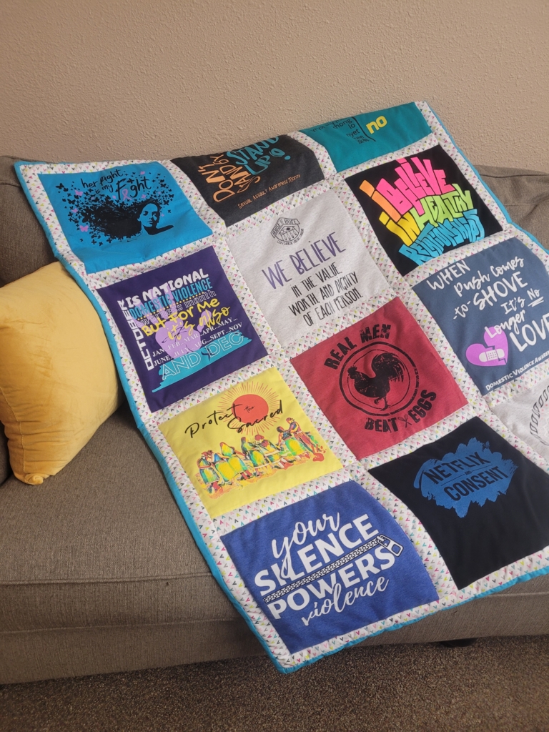 A quilt made of House of Hope awareness campaign t-shirts made to commemorate House of Hope's five-year anniversary.