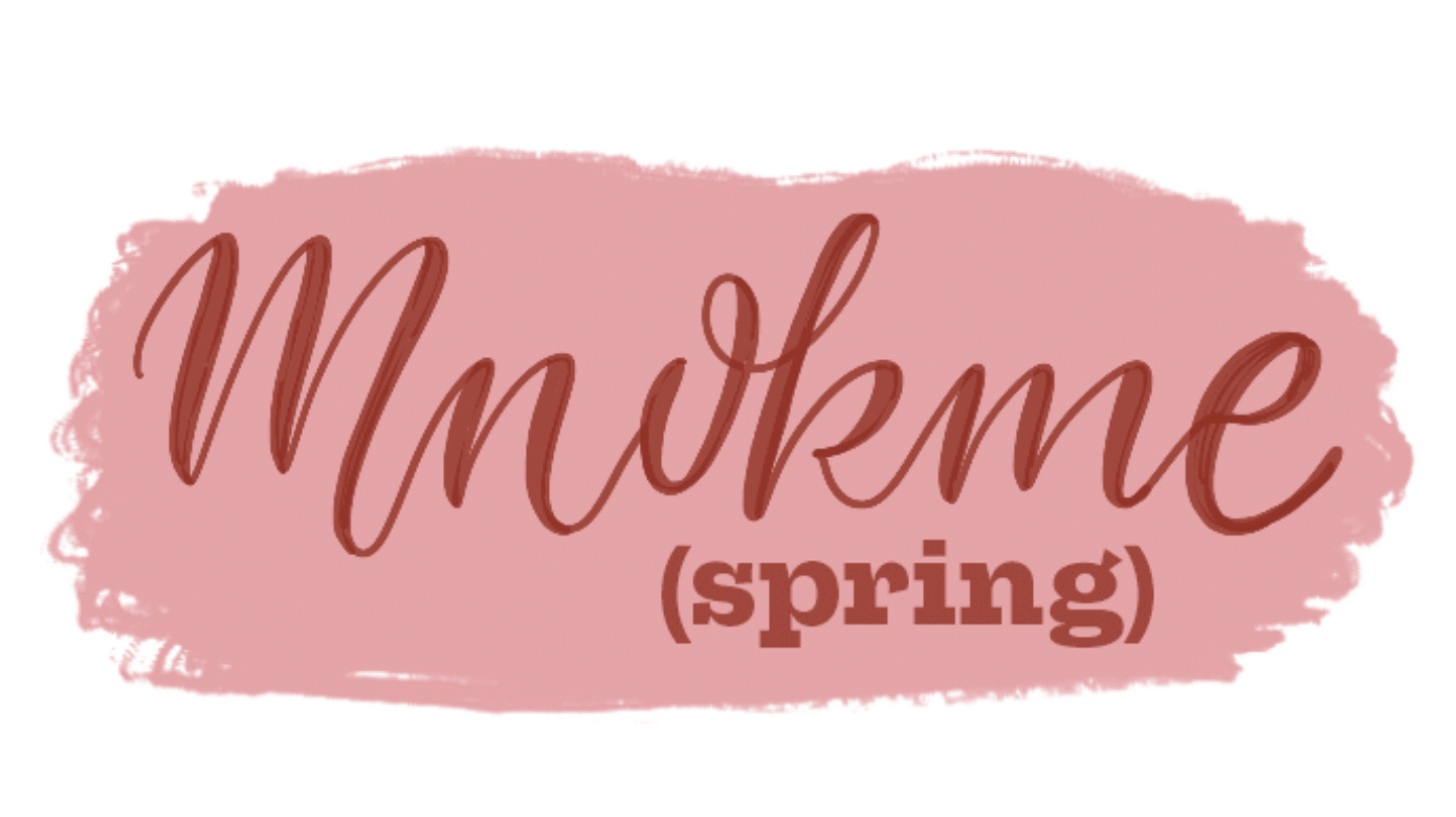 A light pink paint brush stroke with berry red text over it that reads: Mnokme (spring)"