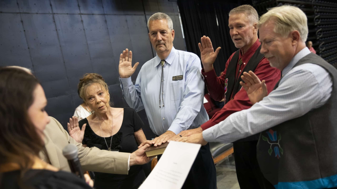 CPN District 7 legislator Mark Johnson, along with District 5 legislator Gene Lambert, District 6 Rande Payne and District 8 Dave Carney are sworn into office at the 2022 CPN General Council meeting.