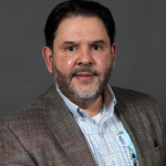 A head shot of Dr. Julio Rojas, psychologist and licensed drug and alcohol counselor.