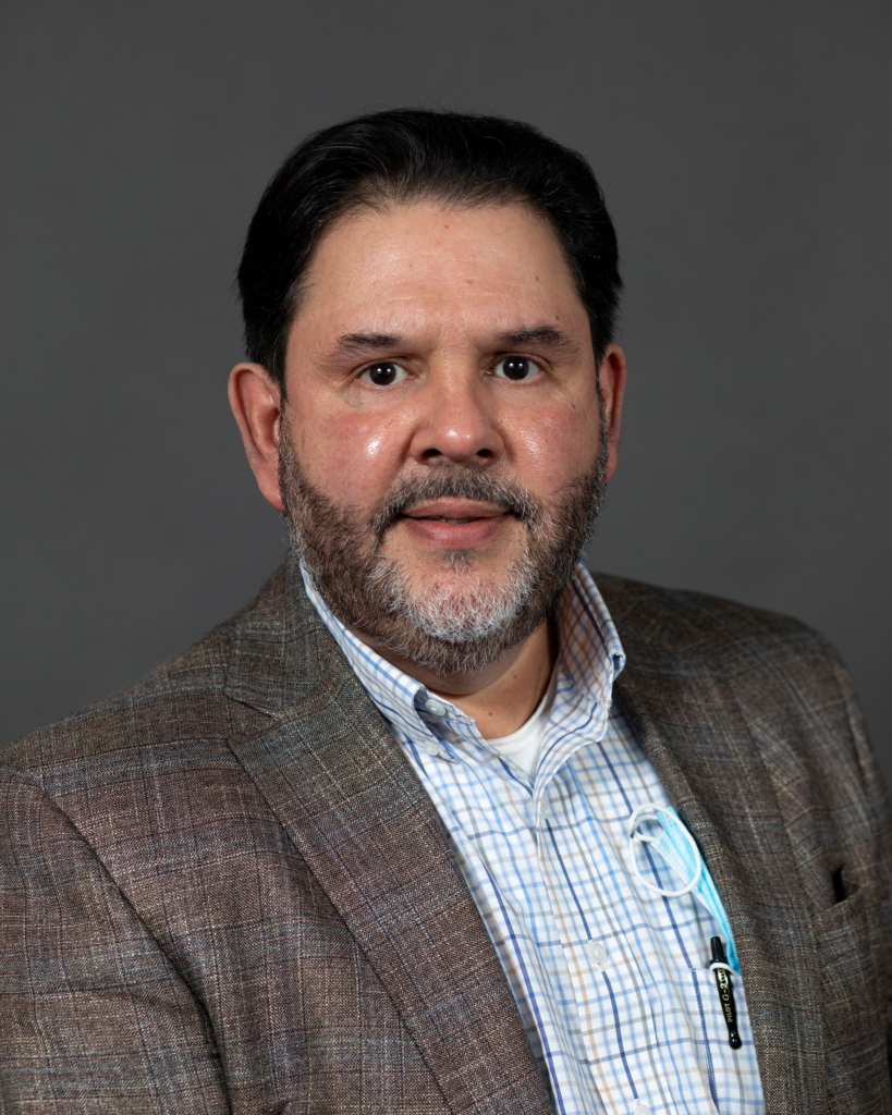 A head shot of Dr. Julio Rojas, psychologist and licensed drug and alcohol counselor.